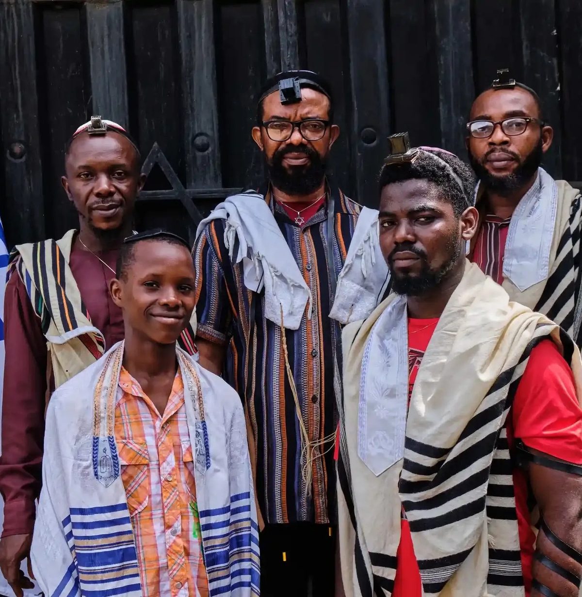 Members of the community wearing prayer shawls