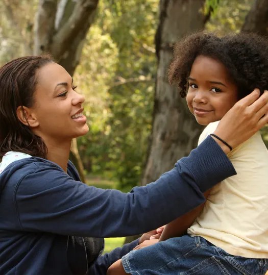 A mother smiling at her daughter
